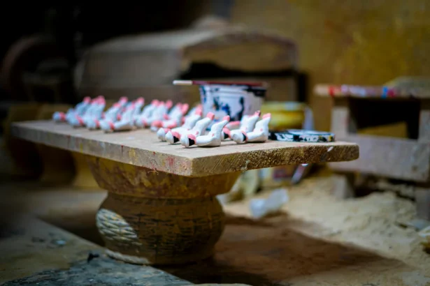 Traditional pottery workshop in Ticul, Yucatán showcasing handcrafted pieces on a table.