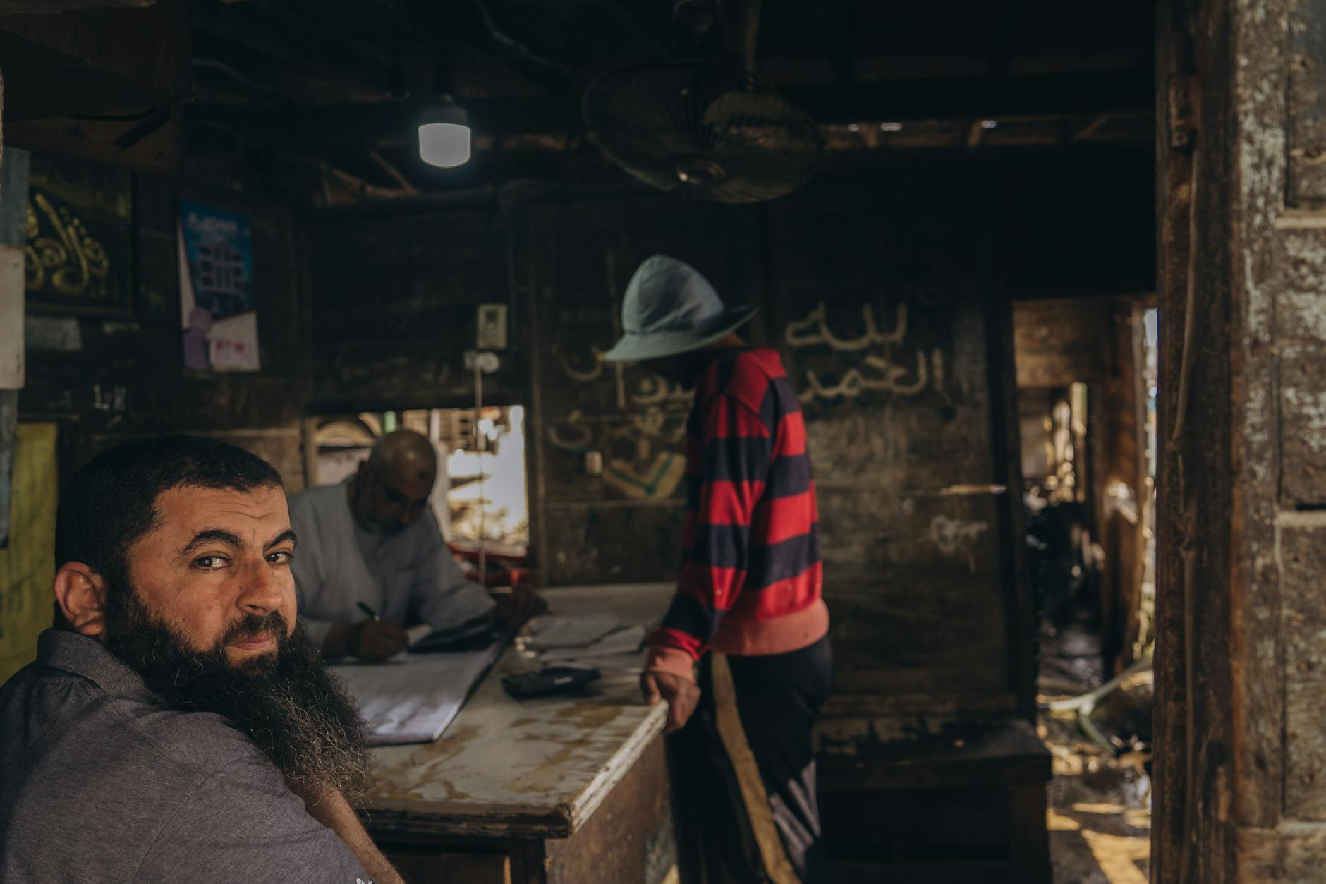 A glimpse inside a local market workshop in Cairo with artisans at work, showcasing traditional craftsmanship.
