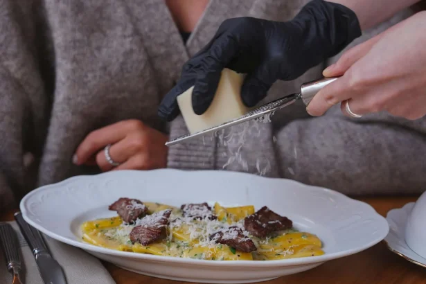 Savor the flavor of pasta topped with freshly grated cheese and tender beef slices.