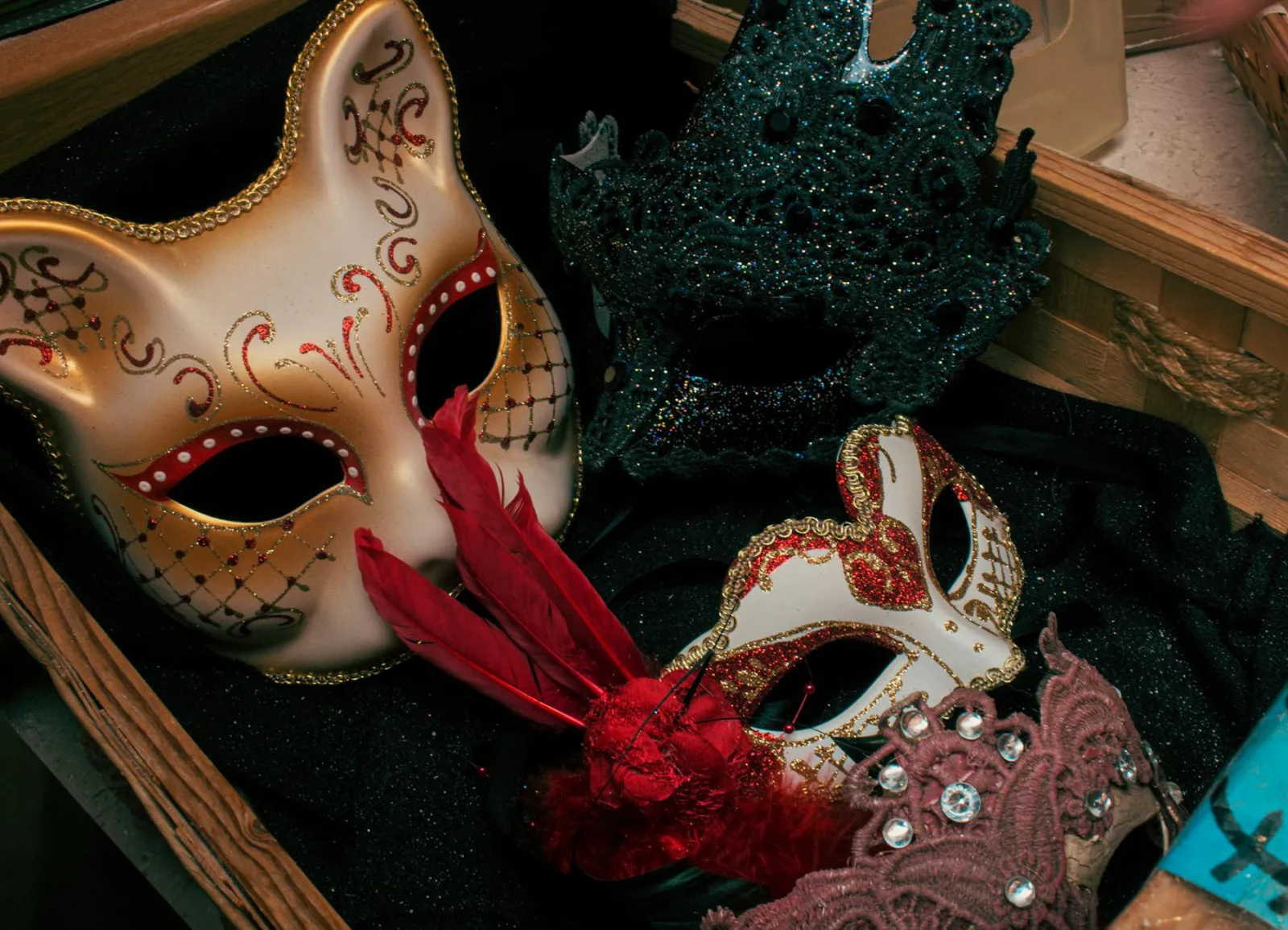 Close-up of ornate Venetian masquerade masks with vibrant details.