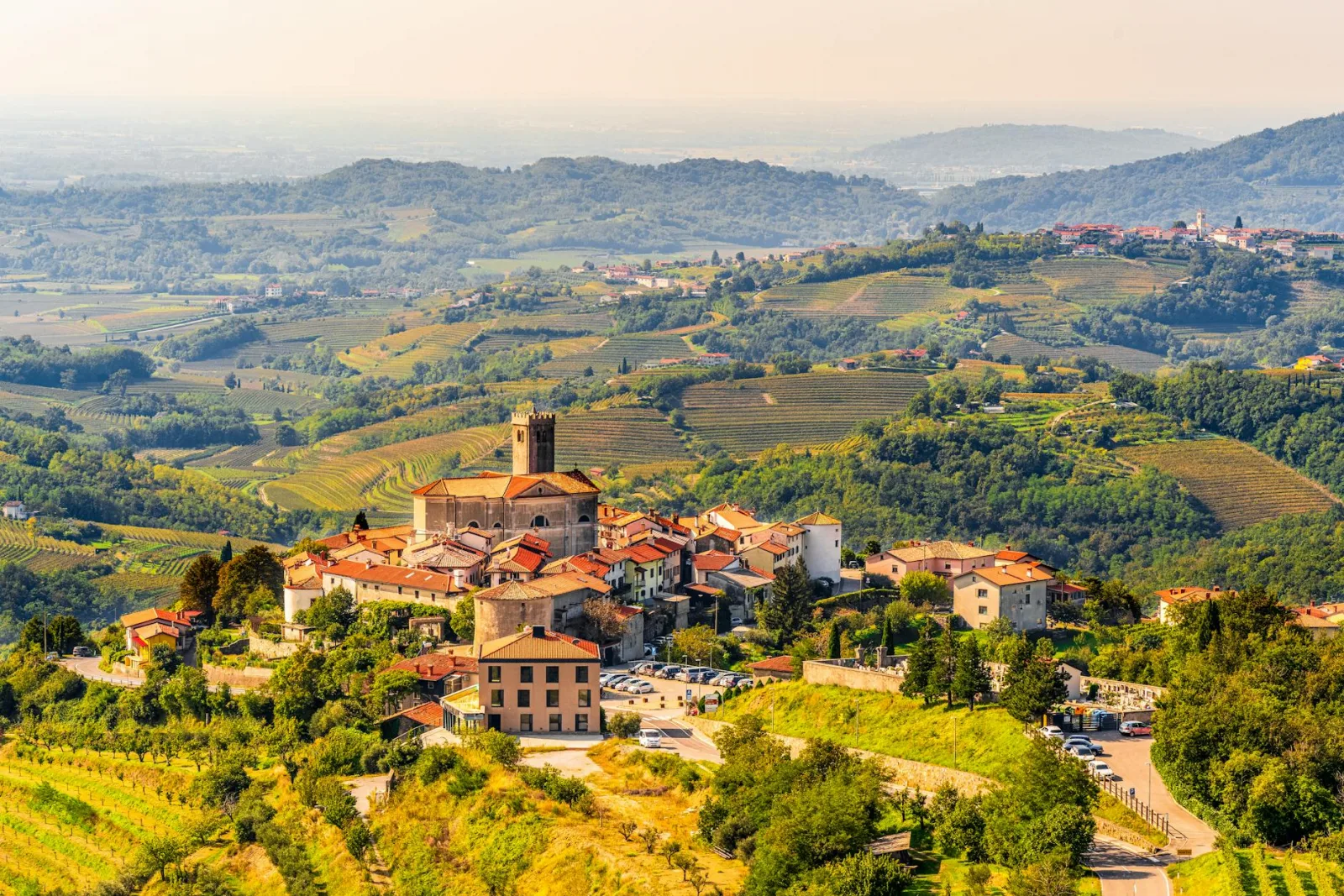 A picturesque hilltop village with vineyards in Gorizia, Italy. Perfect for travel and nature lovers.