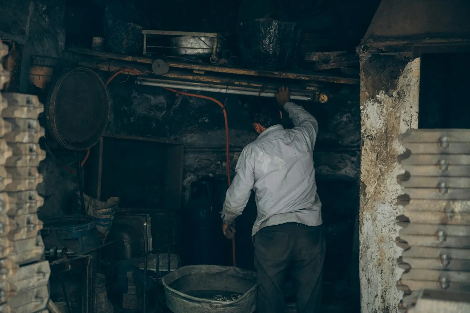 A craftsman in Cairo's old workshop, showcasing traditional Egyptian industry.
