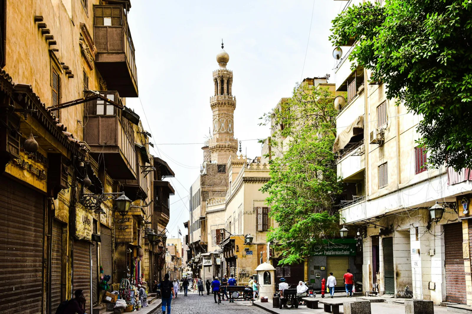 Explore the charm of a bustling historic street in Cairo with stunning architecture and cultural vibrancy.