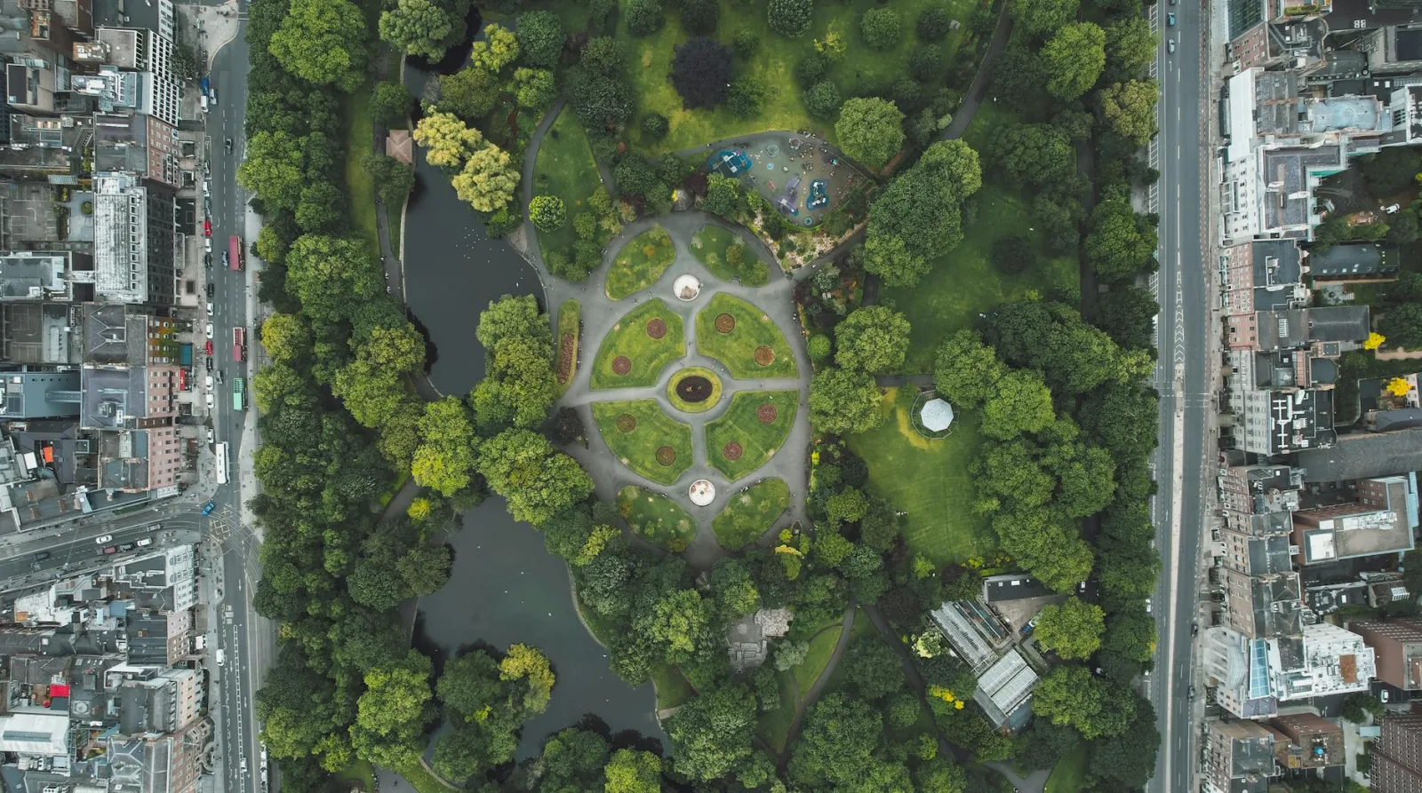 Aerial shot of St. Stephen's Green park in Dublin, showcasing lush gardens and adjacent cityscape.