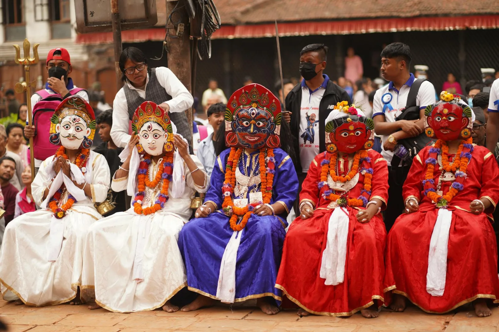 Masked dancers performing a Newar ritual dance during a festival in Kathmandu, Nepal.