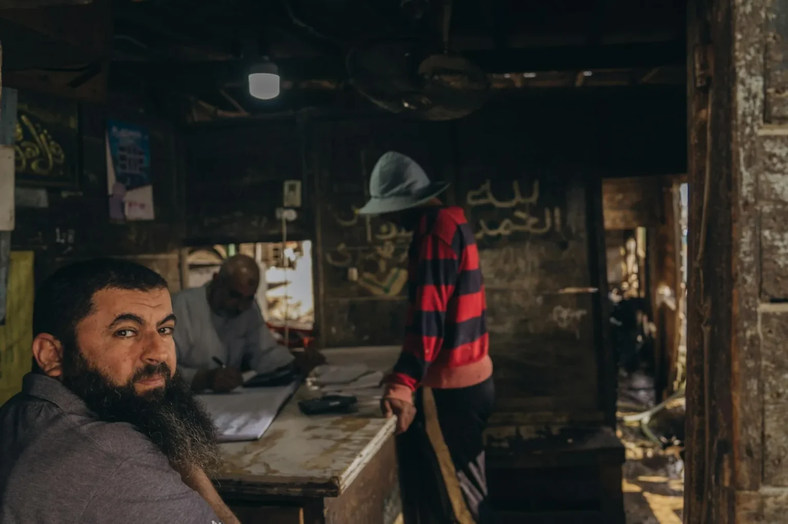 A glimpse inside a local market workshop in Cairo with artisans at work, showcasing traditional craftsmanship.