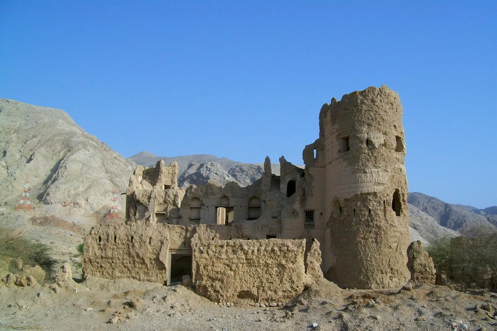 Explore the ancient ruins of a mud brick fort in Muscat, Oman, showcasing history and heritage.