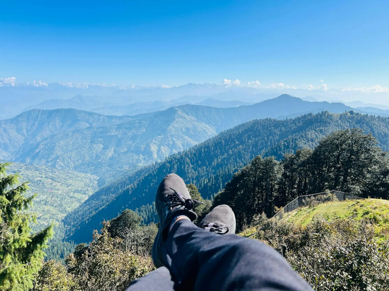 A serene mountain landscape with vast views and a relaxing perspective.