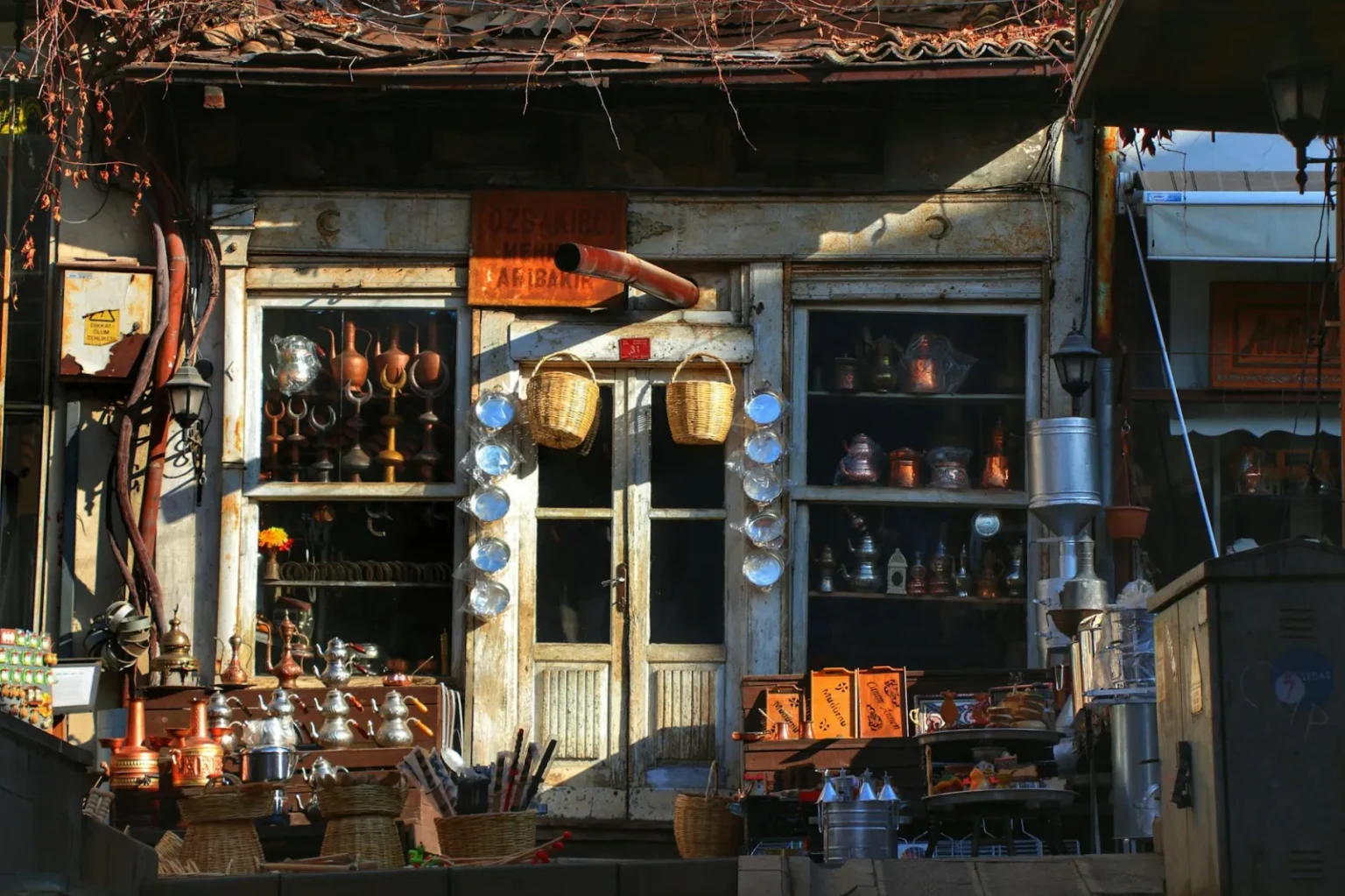 Charming rustic shop with vintage baskets and cookware, showcasing a nostalgic storefront vibe.