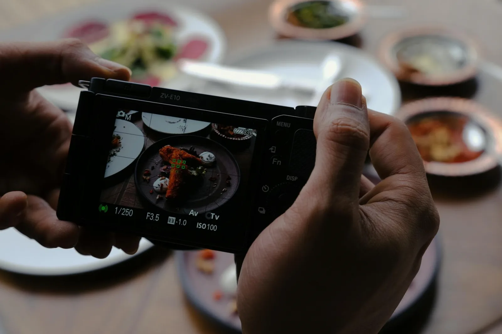 A close-up of a camera capturing a gourmet dish in Istanbul.