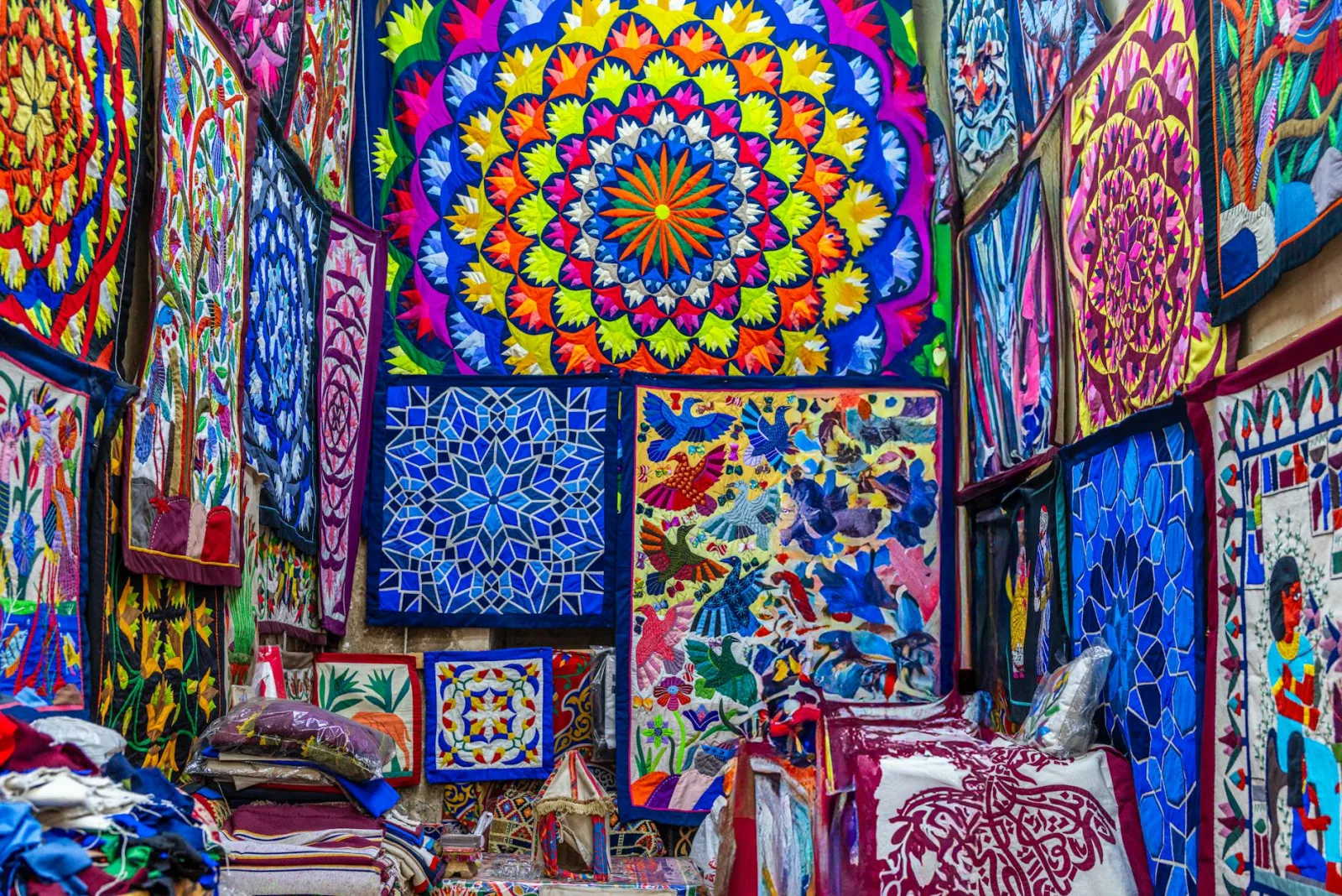 Colorful textile patterns inside a Cairo market, showcasing traditional Egyptian designs.