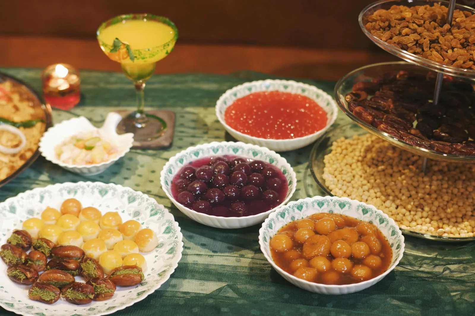 A vibrant display of traditional Indonesian sweets and snacks served for iftar.