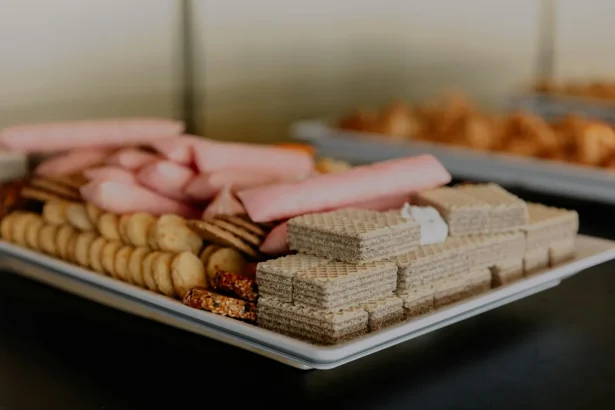 A close-up of a tray with an assortment of wafers and snacks, ideal for gatherings.