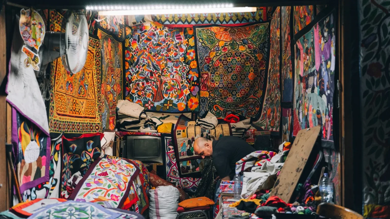 Vibrant textile shop in Cairo, showcasing colorful patterns and traditional crafts.