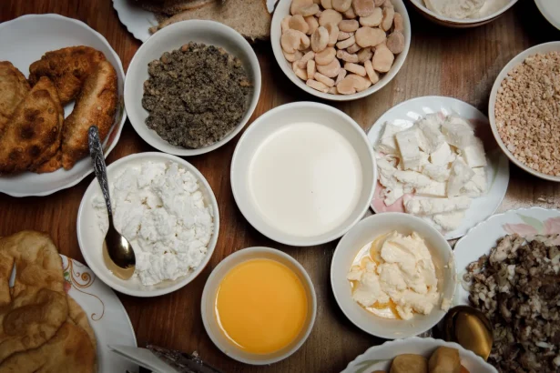 Explore a vibrant flat lay of traditional Tuva cuisine with various dishes and ingredients artistically arranged.