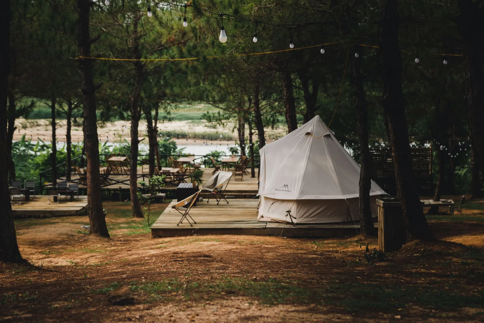 Serene glamping tent setup in lush forests of Kon Tum, Vietnam, perfect for nature retreats.