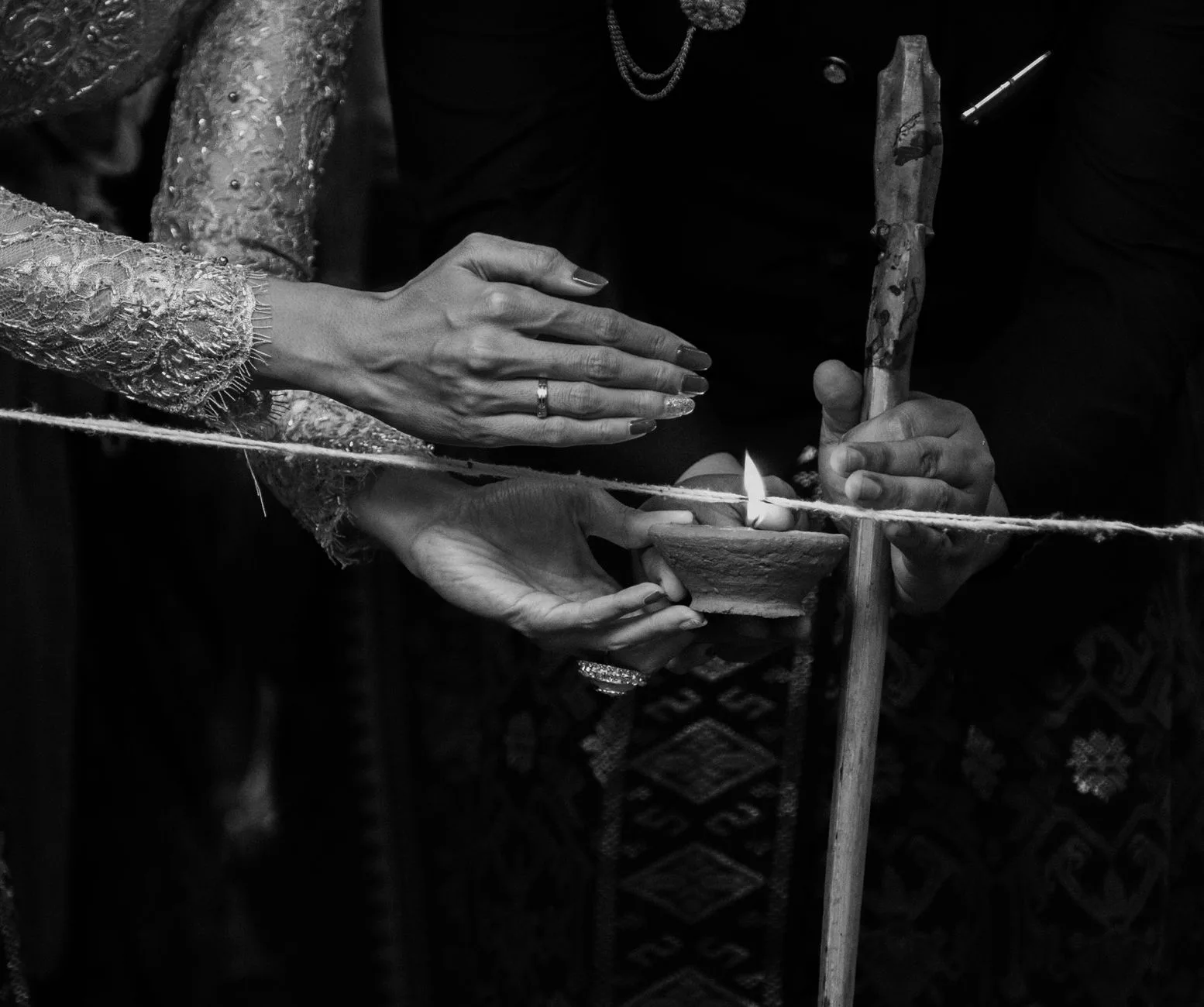 Capturing the essence of Balinese wedding rituals with candle lighting in Gianyar.