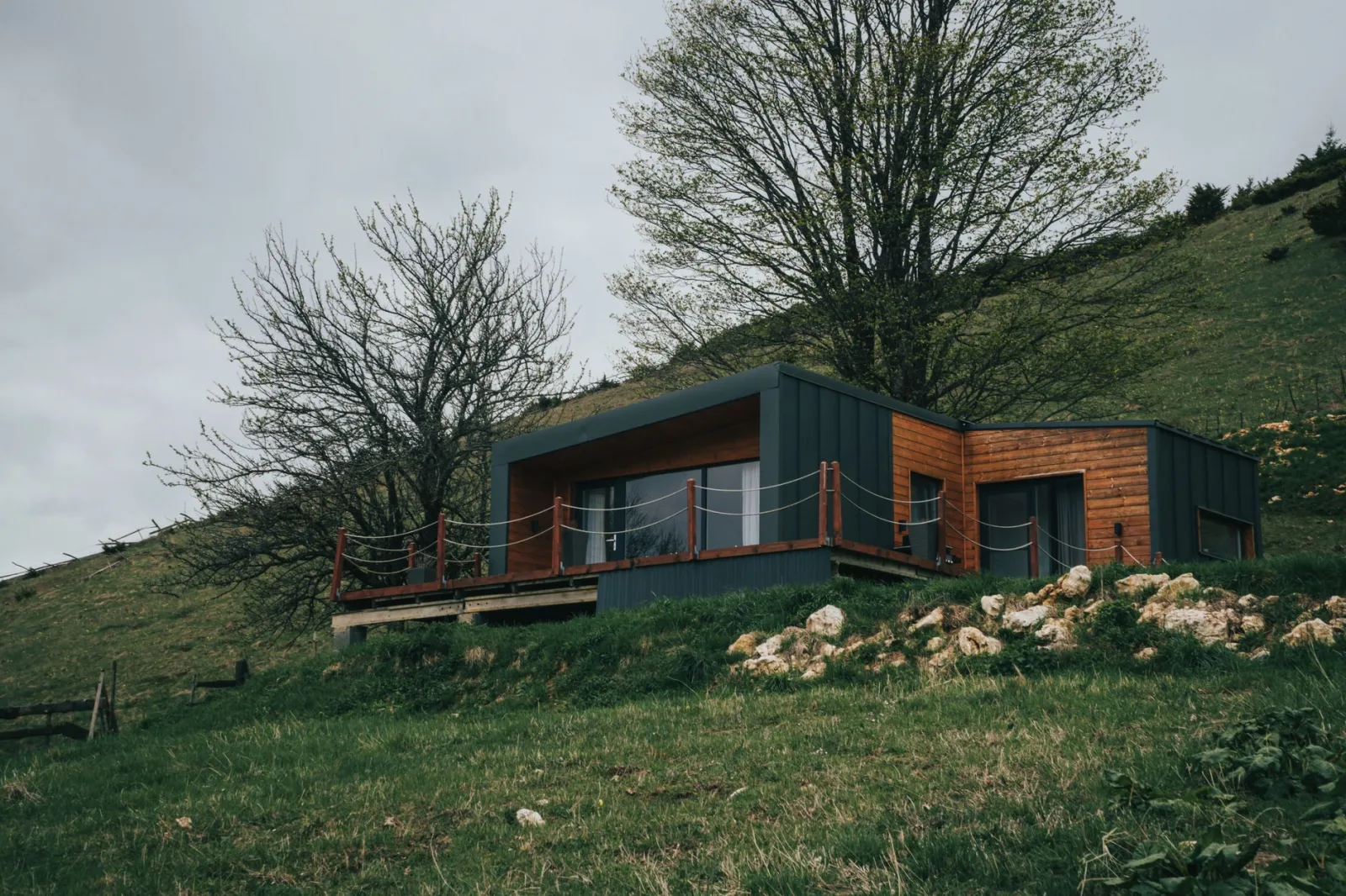 A modern house set in the picturesque rural landscape of Fundata, Romania.