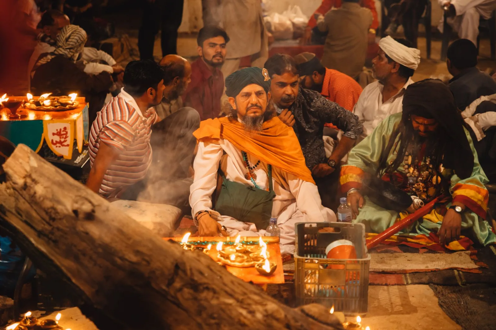 A vibrant cultural ceremony with locals gathered in Lahore, depicting religious rituals and traditional attire.