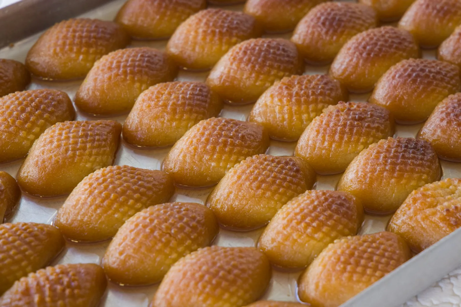 Delicious Turkish desserts displayed in a close-up shot, highlighting their appetizing texture.