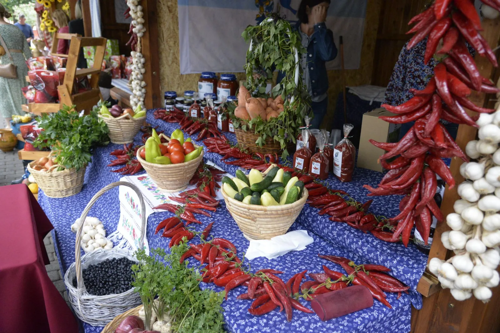 Colorful produce and spices at a lively market in Nyíregyháza, Hungary.