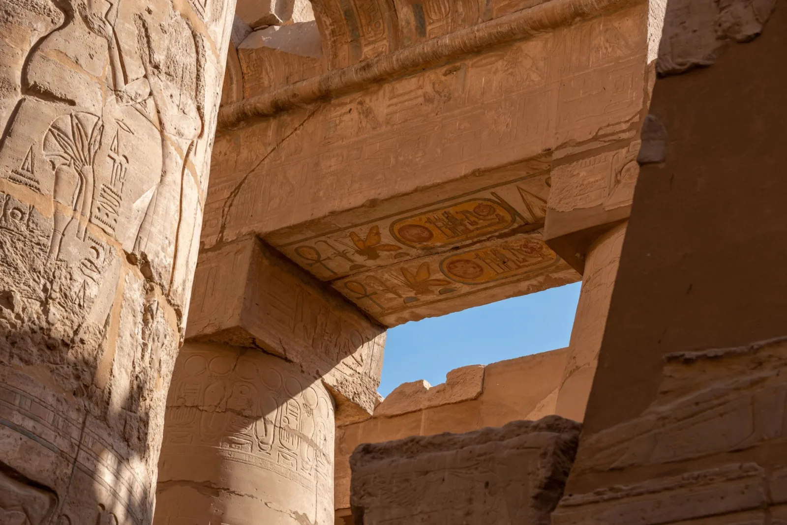 Detailed view of ancient hieroglyphics at Karnak Temple, Egypt, showcasing historical and architectural significance.