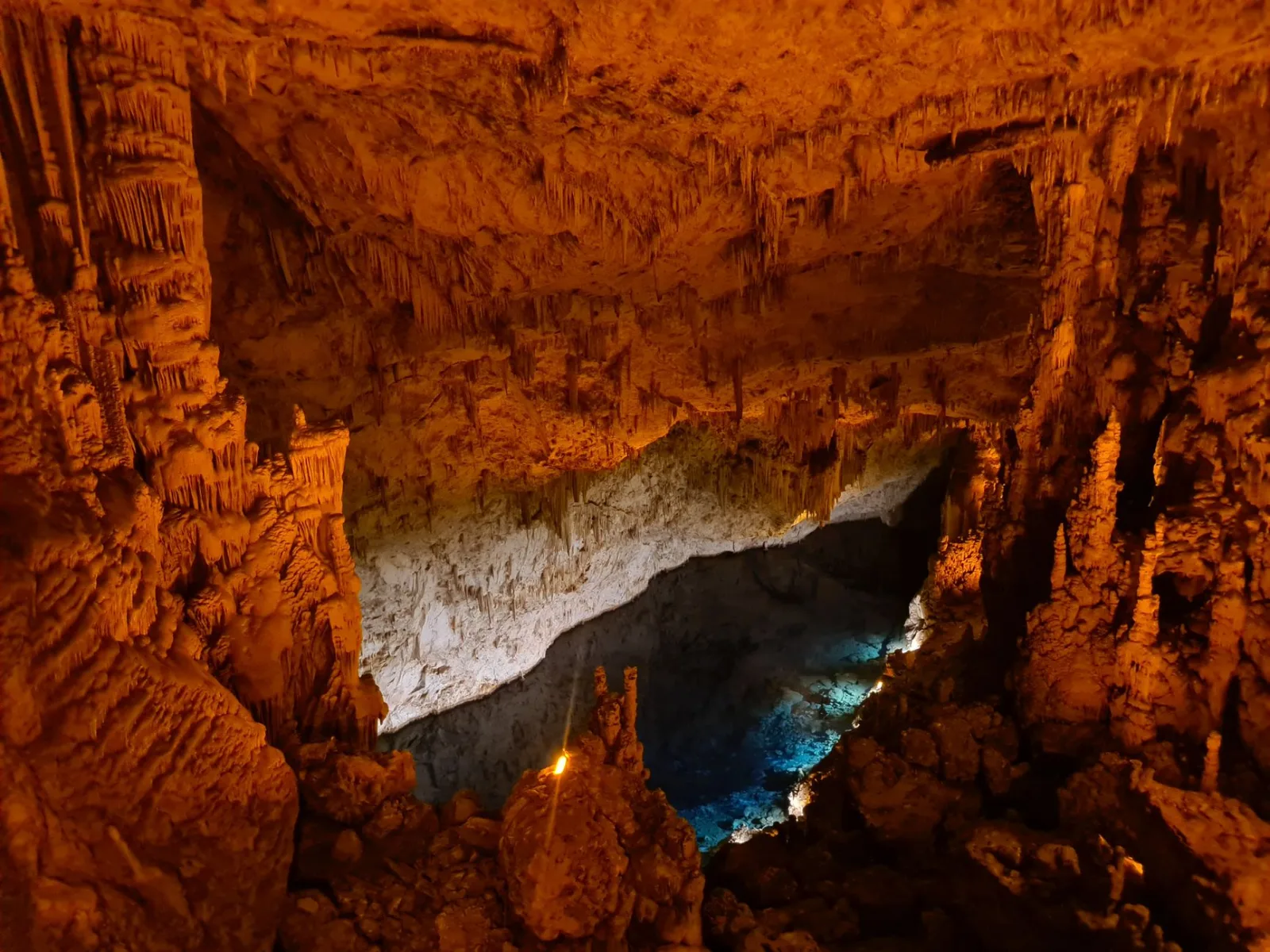 Explore the breathtaking Gilindire Cave with its stunning stalactites and illuminated underground pool.