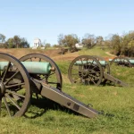 Row of historic cannons displayed outdoors at Vicksburg National Military Park, Mississippi.