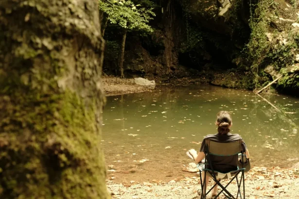 A person enjoying solitude by a serene lake in Hacıllı, İstanbul, Türkiye.