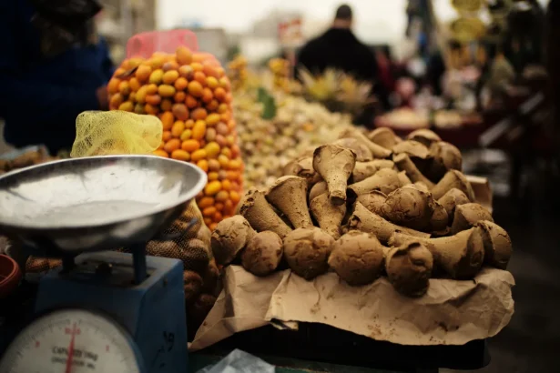 Vibrant Cairo market featuring a variety of fresh produce and spices.