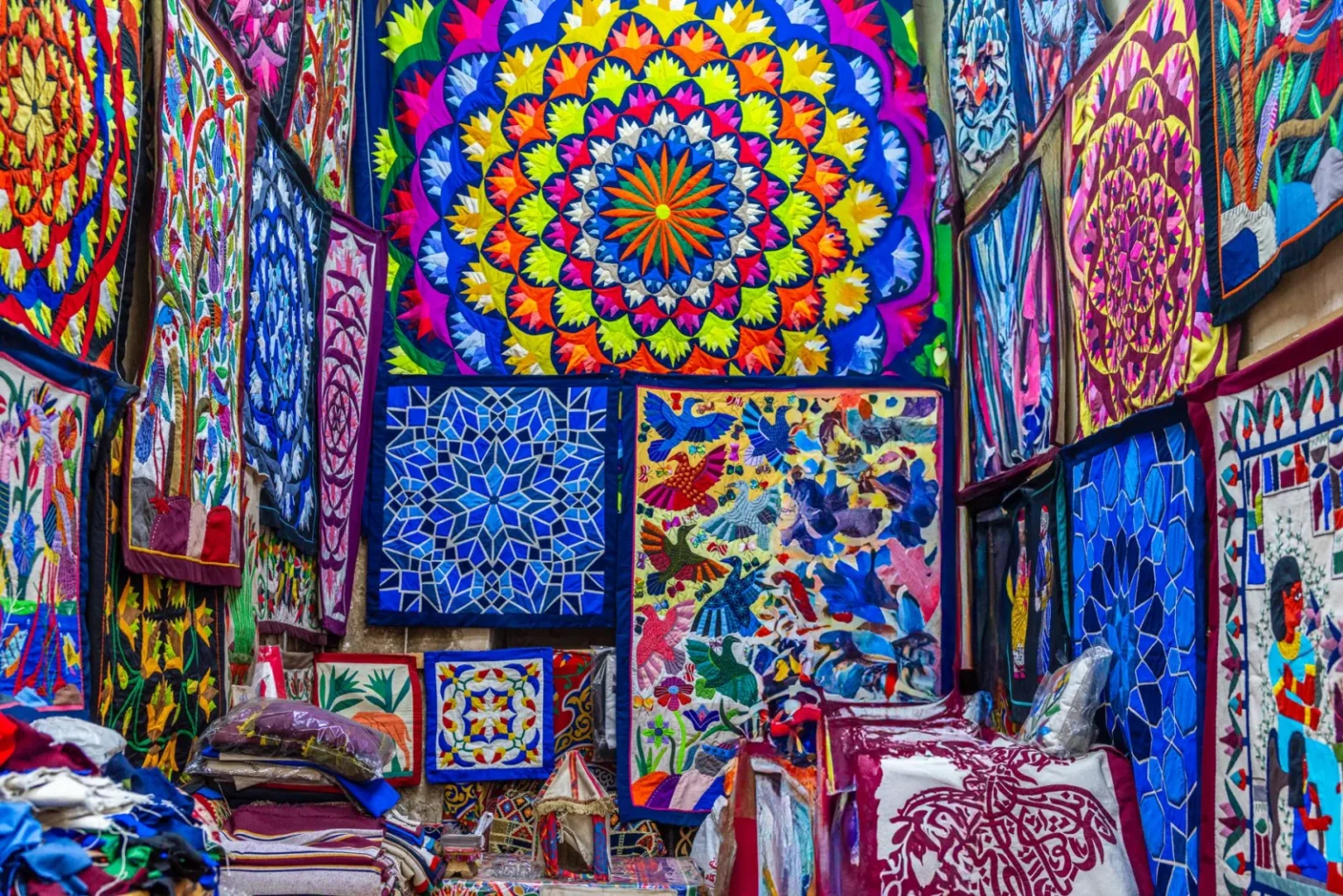 Colorful textile patterns inside a Cairo market, showcasing traditional Egyptian designs.