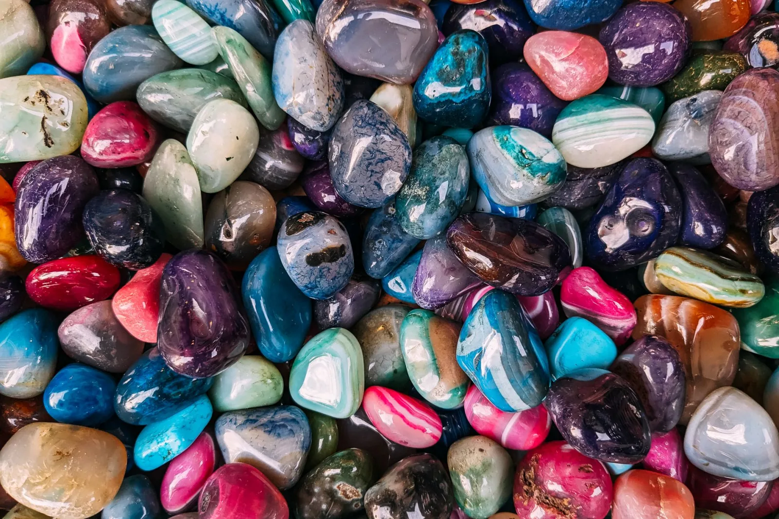 A colorful assortment of polished gemstones showcasing natural beauty and luster.