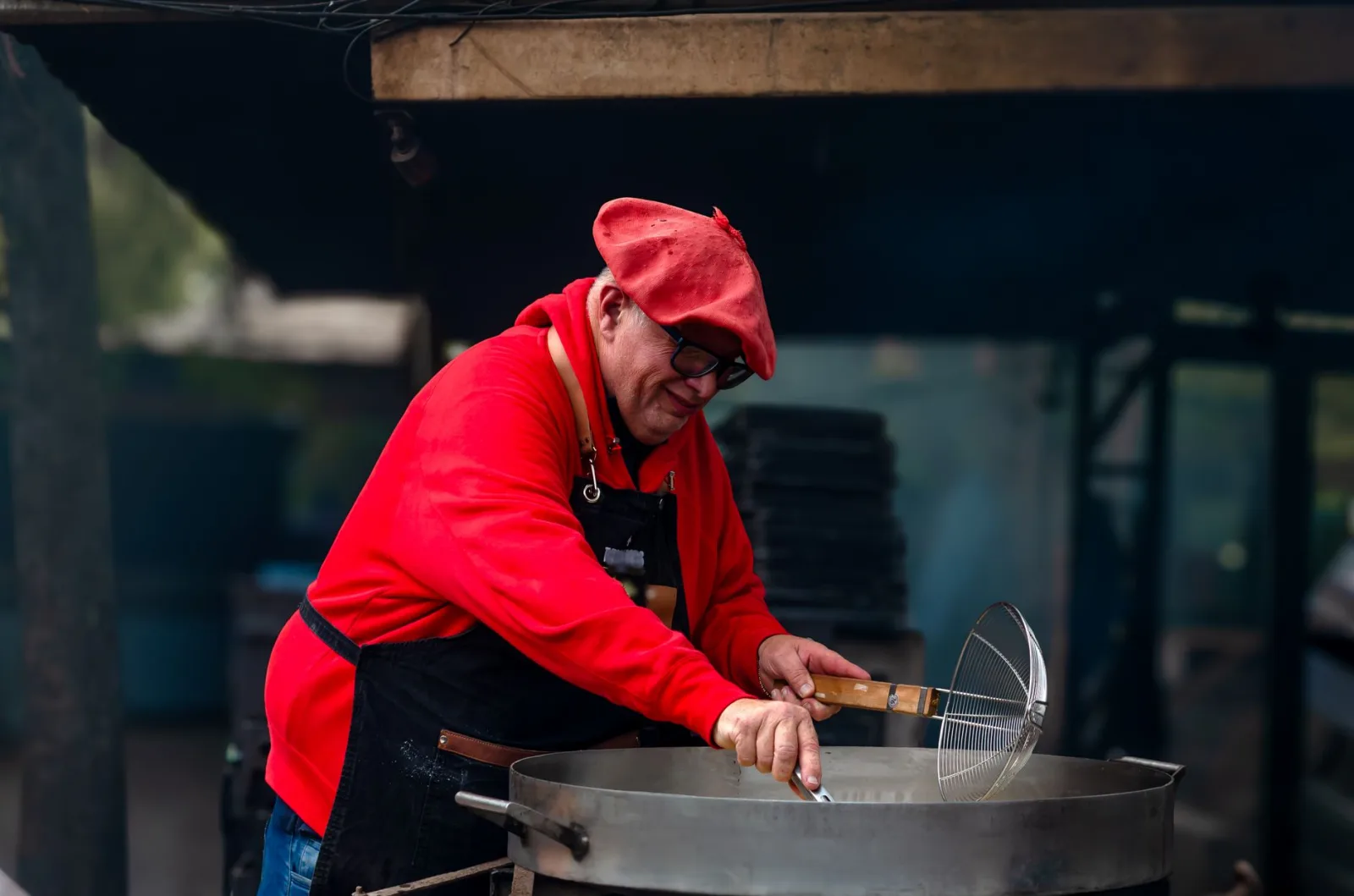 Street vendor cooking local cuisine in Buenos Aires, highlighting vibrant culture and culinary tradition.