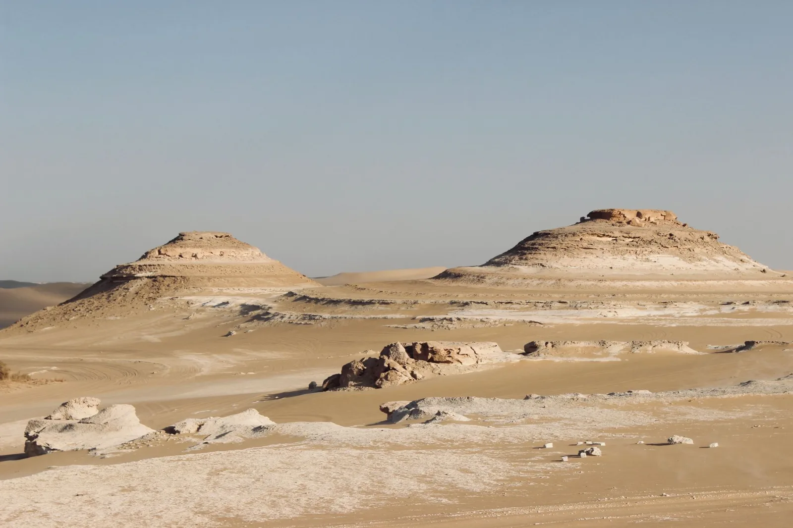 Explore the arid desert landscape of Matrouh, Egypt, showcasing unique geological formations.