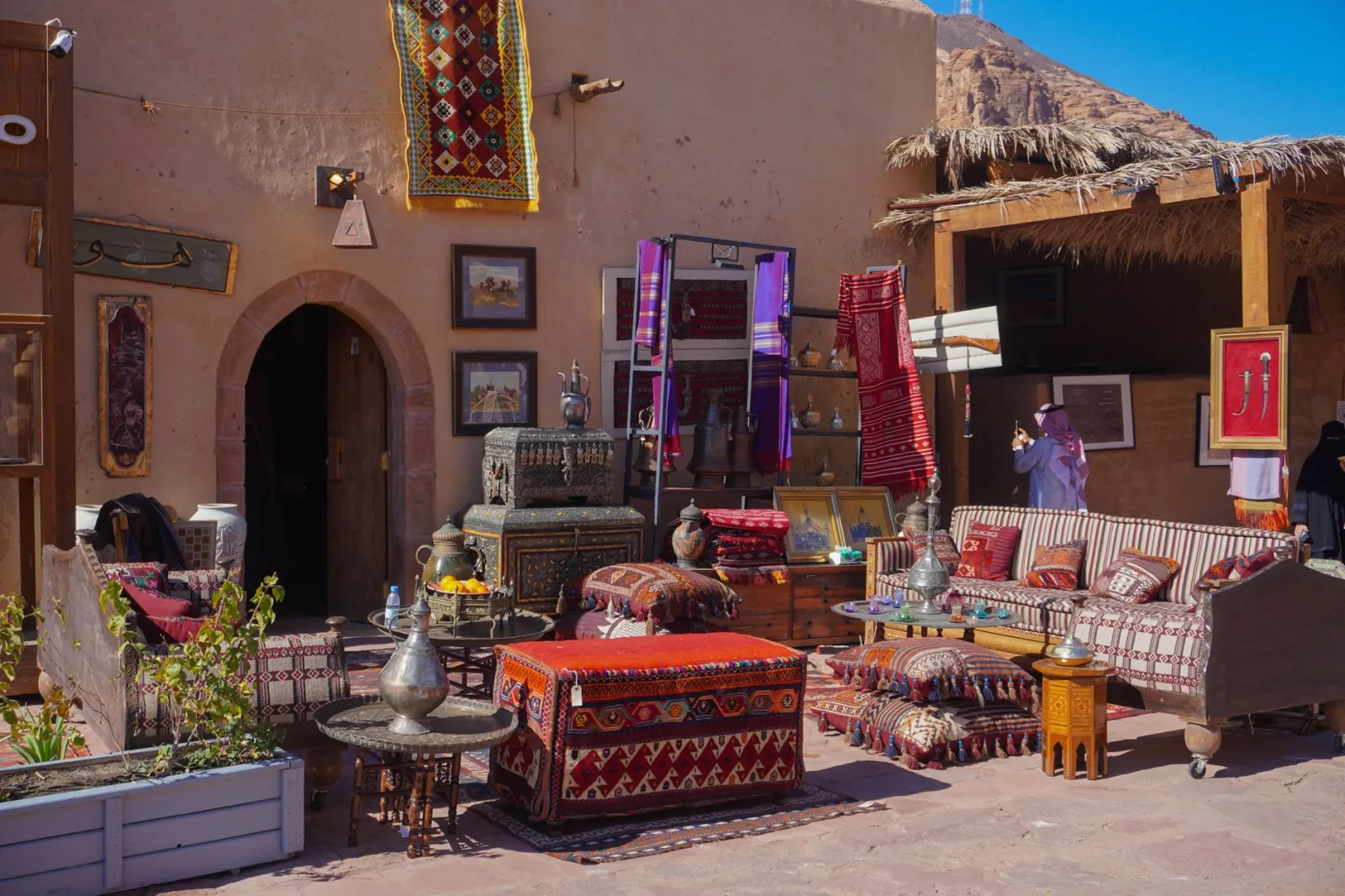 Explore traditional Arabian decor at a vibrant outdoor market in Saudi Arabia.
