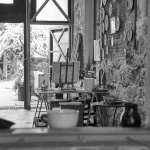 A detailed view of an artist's workshop with easels and paintings in Paphos, Cyprus.