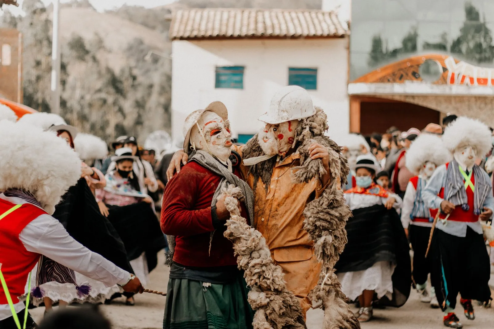Colorful traditional festival in Jauja, Peru with costumed performers celebrating cultural heritage.