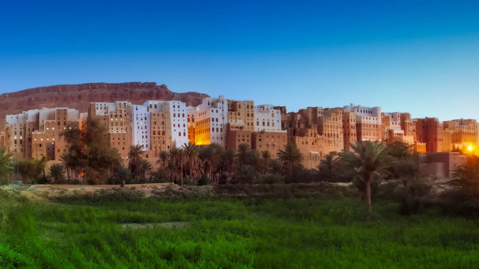 Breathtaking sunset over Shibam's historic mudbrick architecture, Yemen's 'Manhattan of the Desert.'